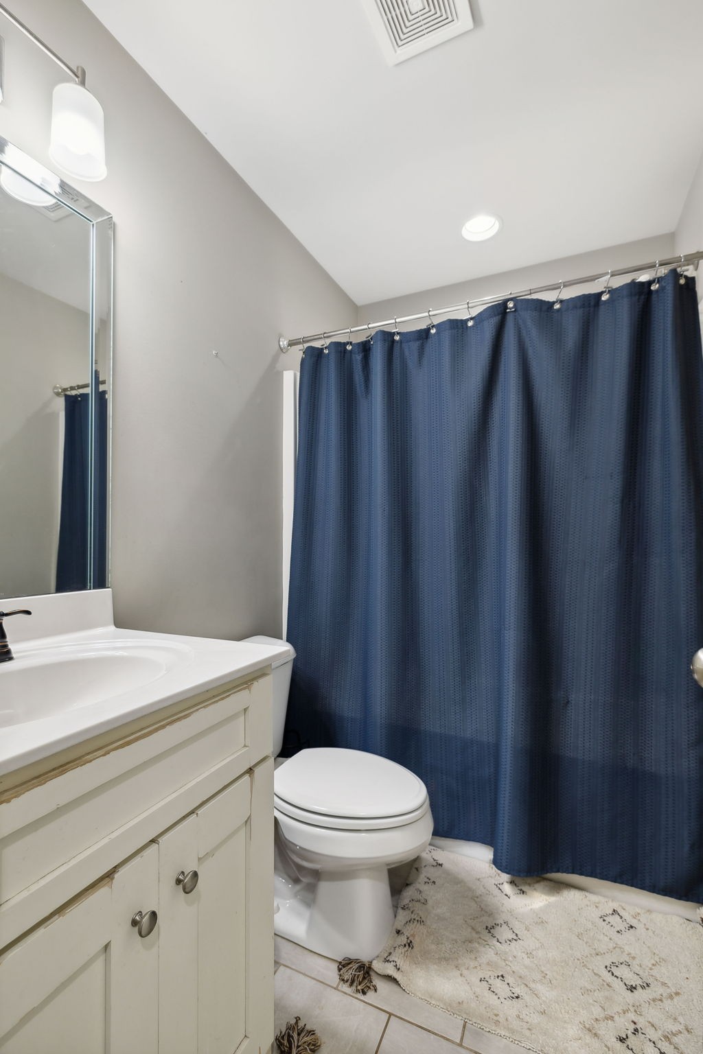101 Flat Woods Road Lebanon, TN 37090 - Photo 38 of 55 a bathroom with a toilet a sink and vanity