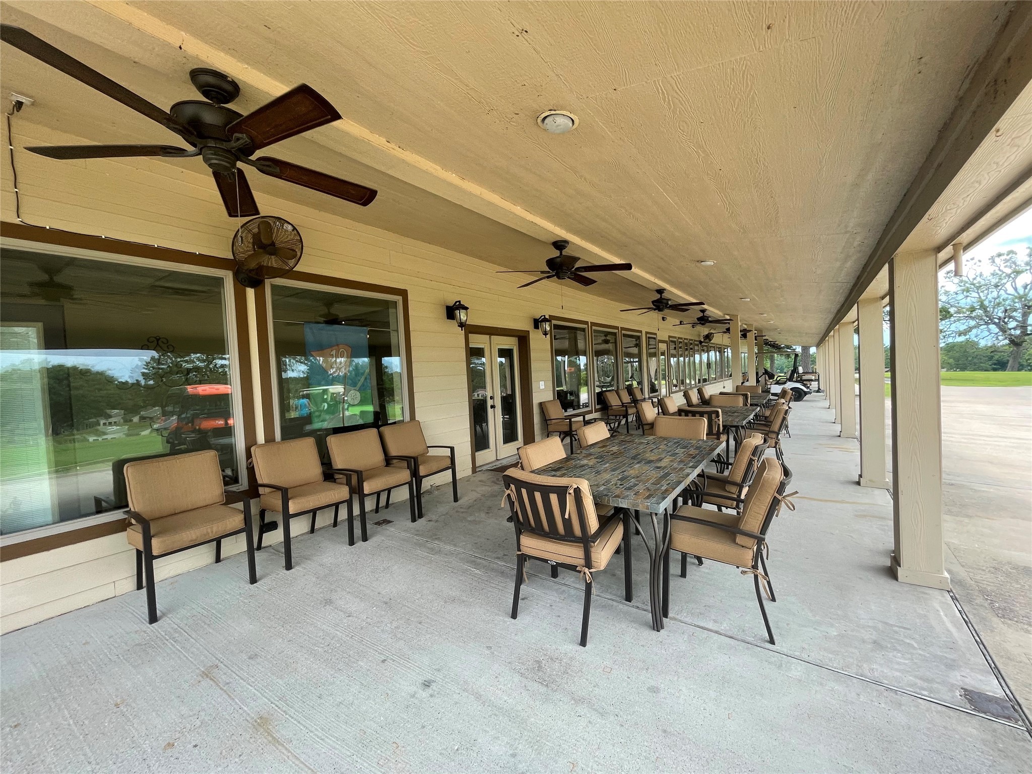 106 Westlake Road Trinity, TX 75862 - Photo 21 of 36 Outside dining overlooking golf course and putting green