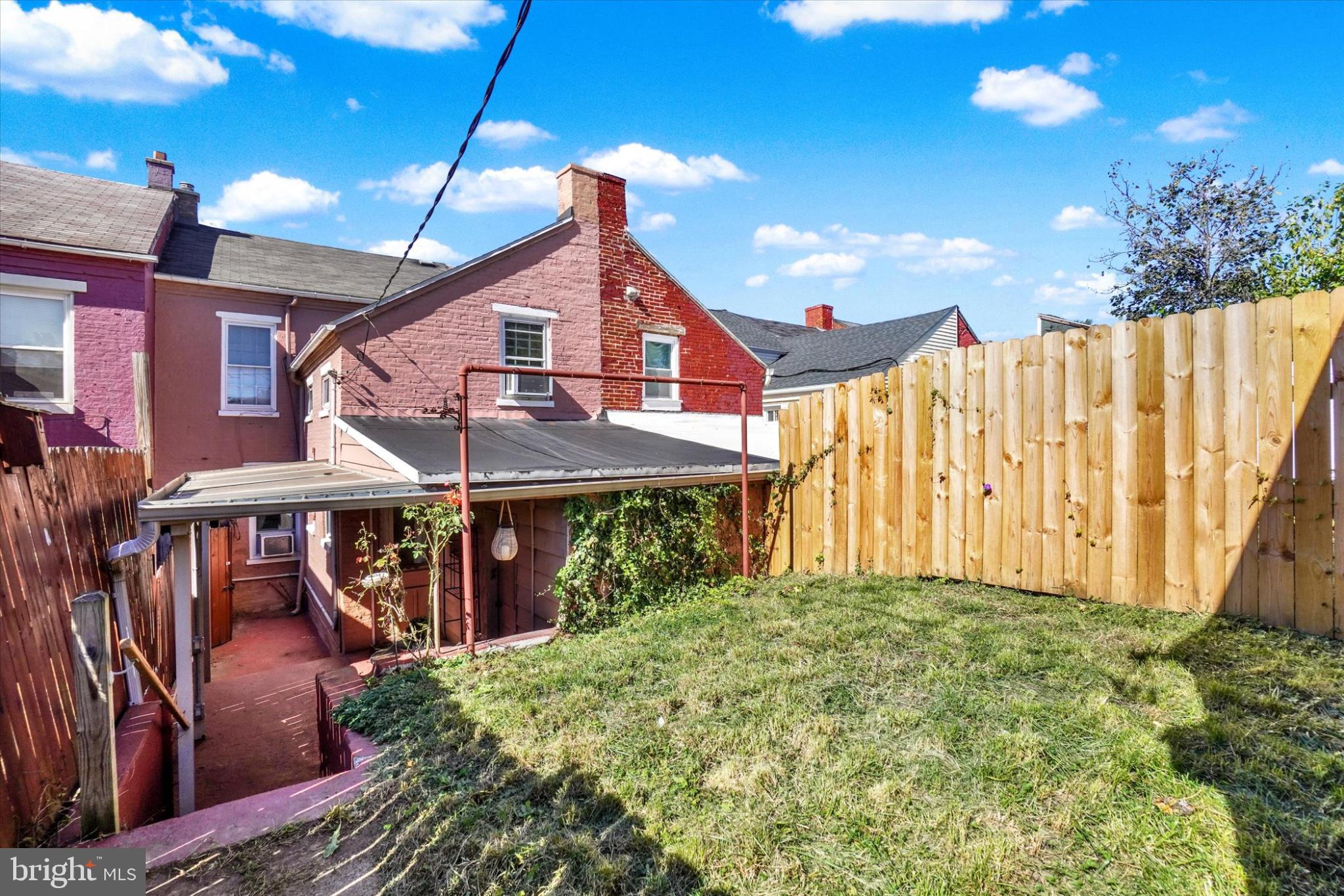 224 Perry Street Columbia, PA 17512 - Photo 24 of 34 Inviting backyard oasis with privacy fence.