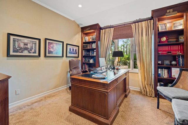 a view of a kitchen with stainless steel appliances granite countertop a stove and a refrigerator