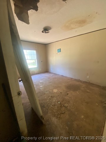 1329 McArthur Road Maxton, NC 28364 - Photo 8 of 12 a view of a livingroom with an empty space