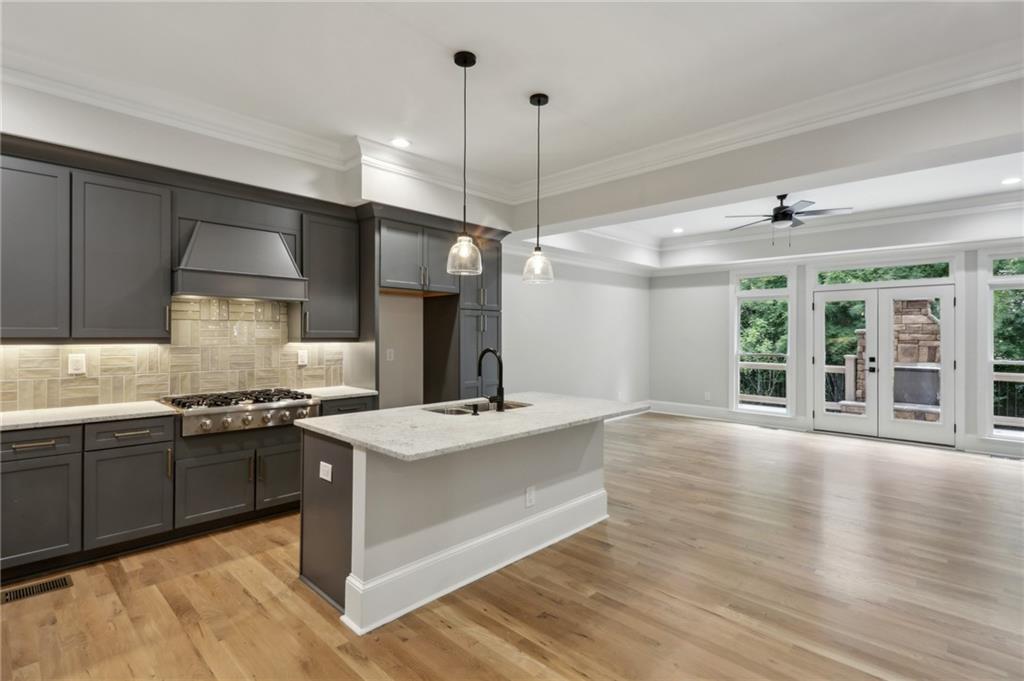 240 Mystic Ridge Hill Sandy Springs, GA 30342 - Photo 1 of 1 a kitchen with stainless steel appliances granite countertop a sink stove and refrigerator