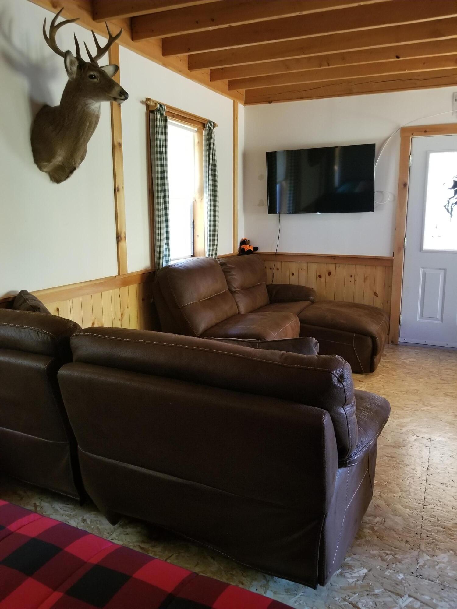 195 Sawyers Mills Road Starks, ME 04911 - Photo 12 of 33 Living room