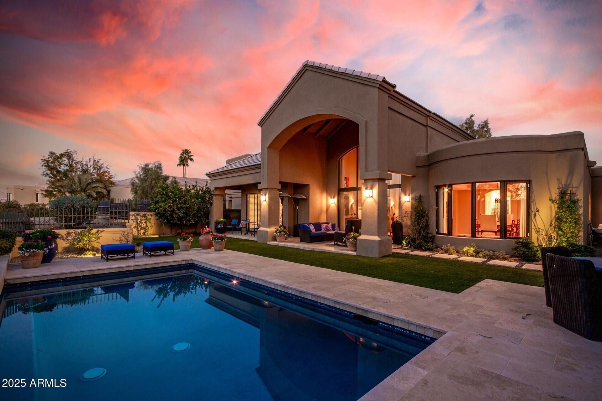 7878 East Gainey Ranch Road, Unit 41 Scottsdale, AZ 85258 - Photo 35 of 46 a view of a house with swimming pool