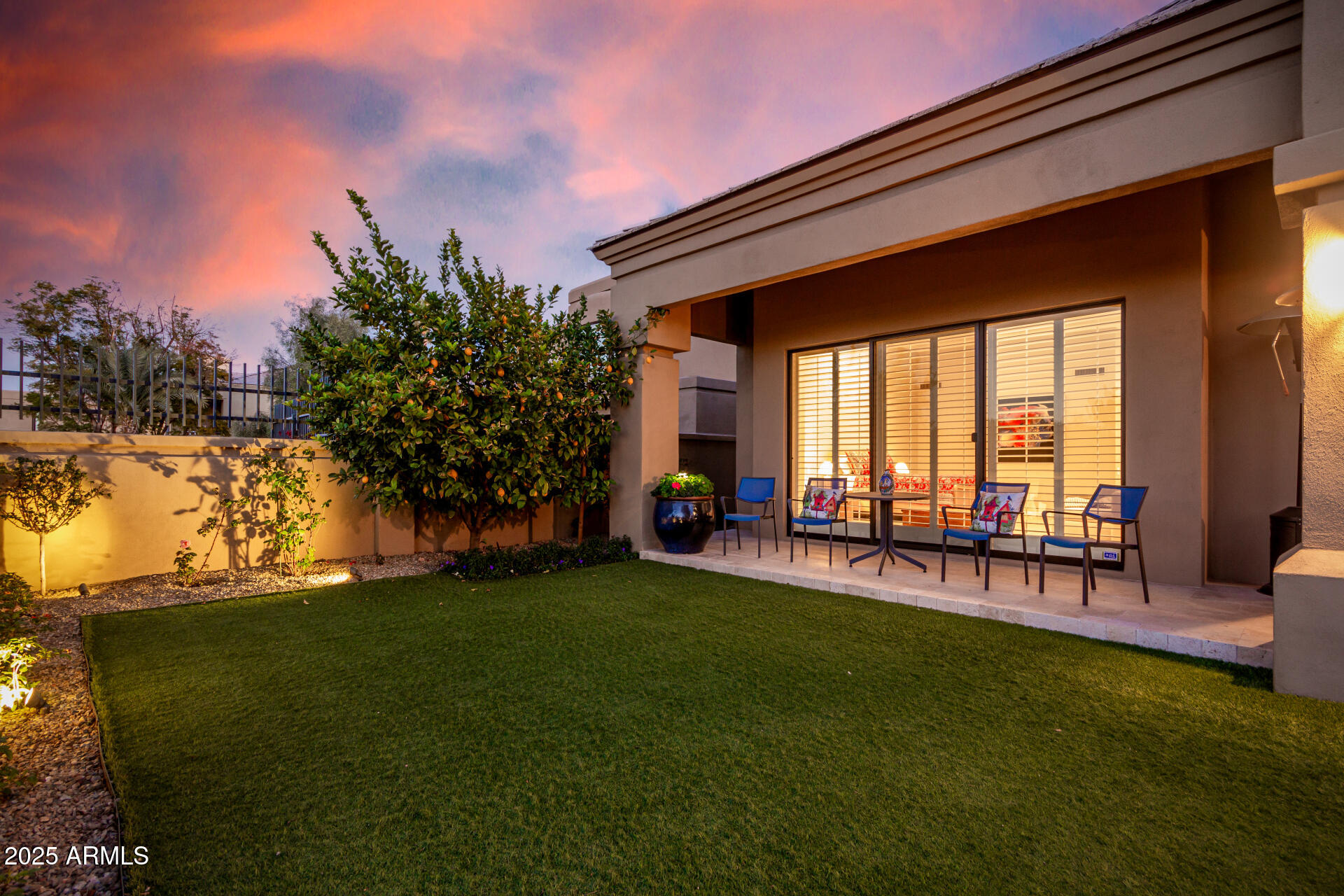 7878 East Gainey Ranch Road, Unit 41 Scottsdale, AZ 85258 - Photo 37 of 46 a view of a backyard with a garden and plants