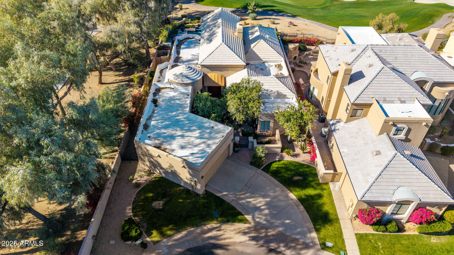 7878 East Gainey Ranch Road, Unit 41 Scottsdale, AZ 85258 - Photo 42 of 46 an aerial view of residential house with outdoor space and trees