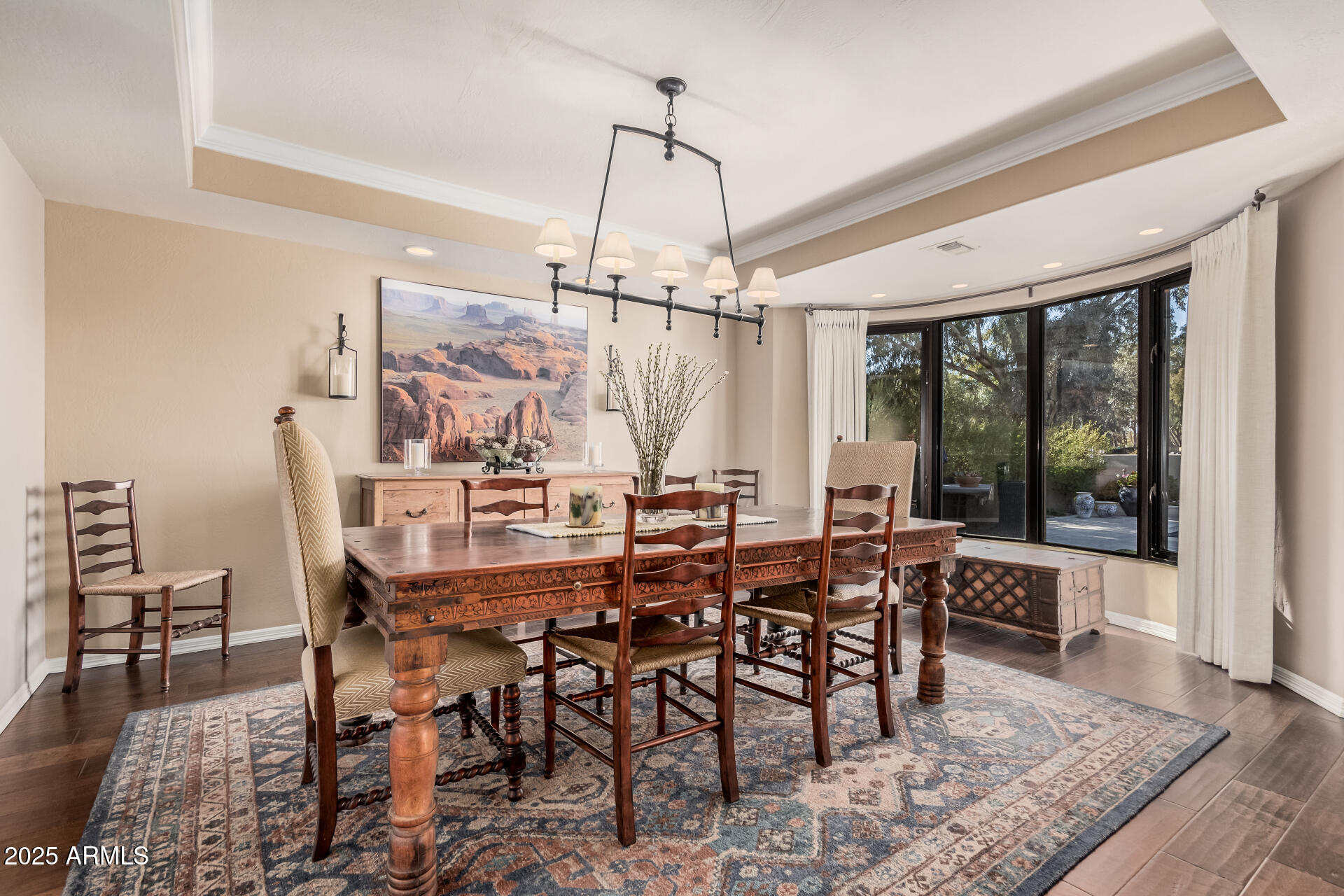7878 East Gainey Ranch Road, Unit 41 Scottsdale, AZ 85258 - Photo 9 of 46 a view of a dining room with furniture window and wooden floor