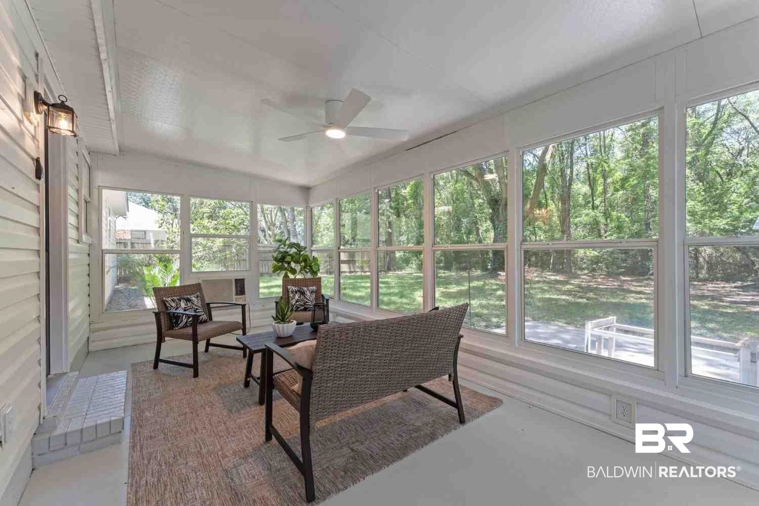 10251 Windmill Road Fairhope, AL 36532 - Photo 37 of 44 Sunroom / solarium with ceiling fan and plenty of natural light