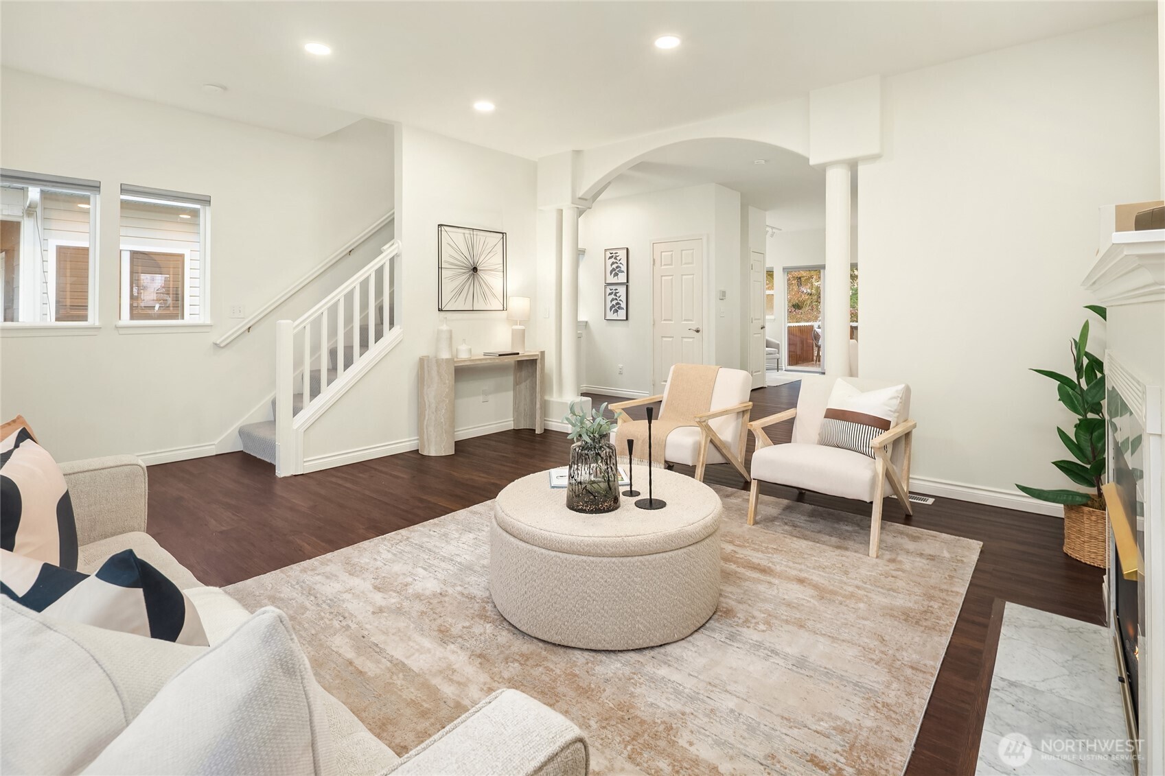 755 Northwest Juniper Street Issaquah, WA 98027 - Photo 9 of 39 a living room with furniture and a wooden floor