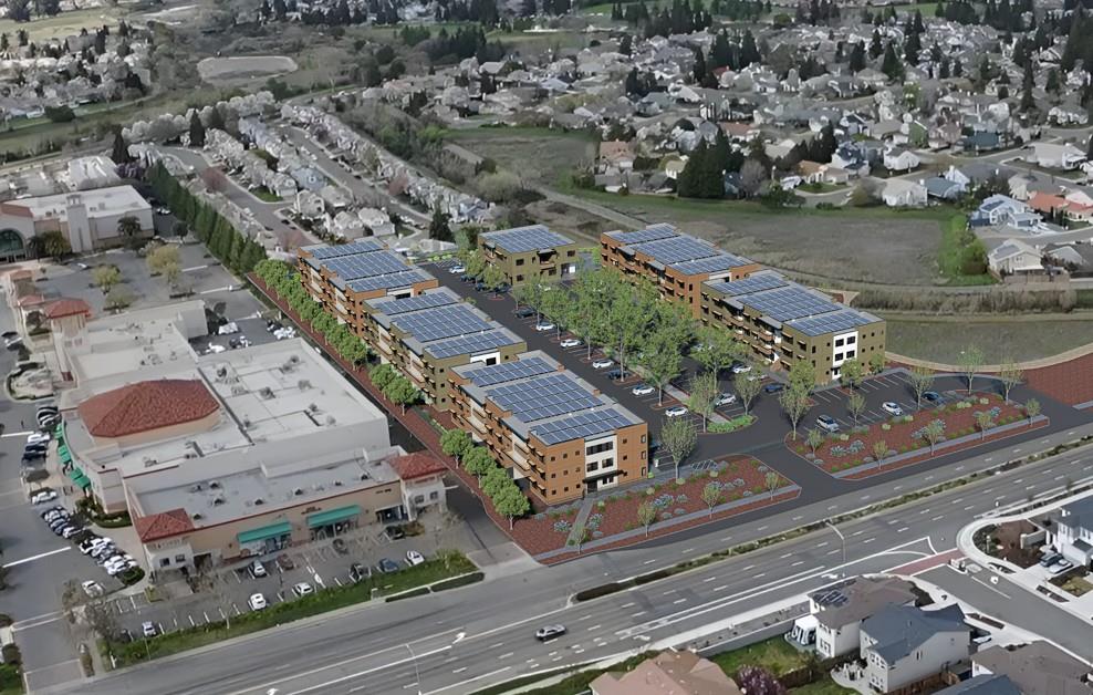 an aerial view of a city with lots of residential buildings