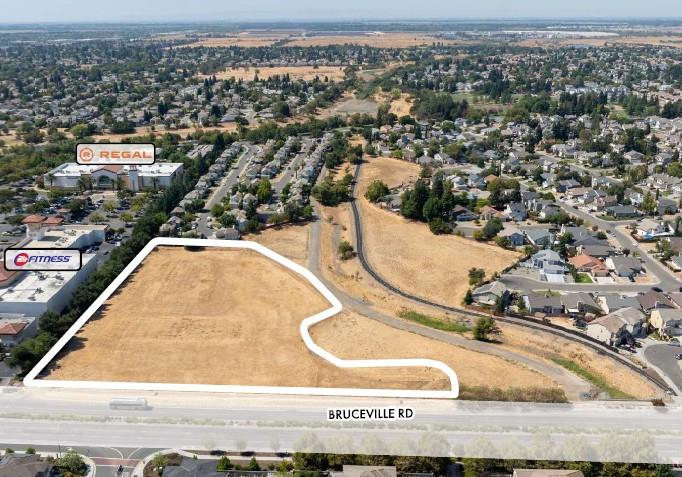 8740 Bruceville Road Sacramento, CA 95823 - Photo 11 of 11 an aerial view of residential houses with outdoor space