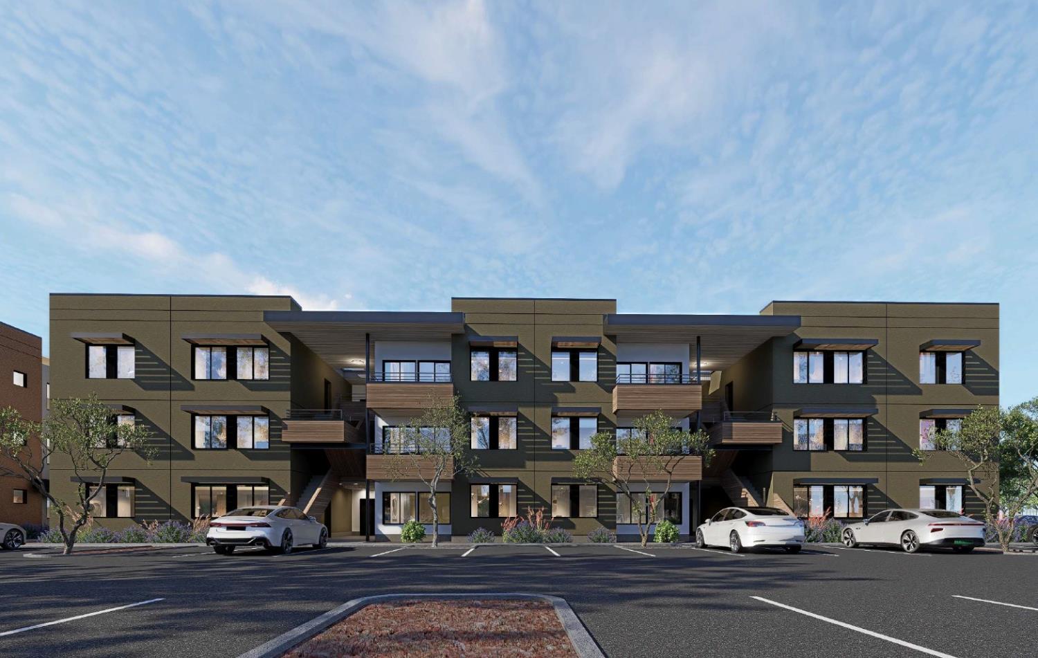 8740 Bruceville Road Sacramento, CA 95823 - Photo 4 of 11 a view of a brick building next to a road