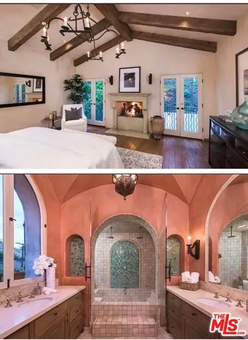 a outdoor living room with fireplace and furniture