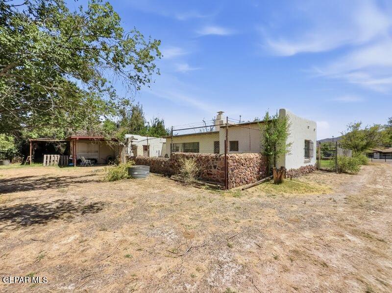 4135 Emory Road El Paso, TX 79922 - Photo 30 of 73 a view of a house with a yard