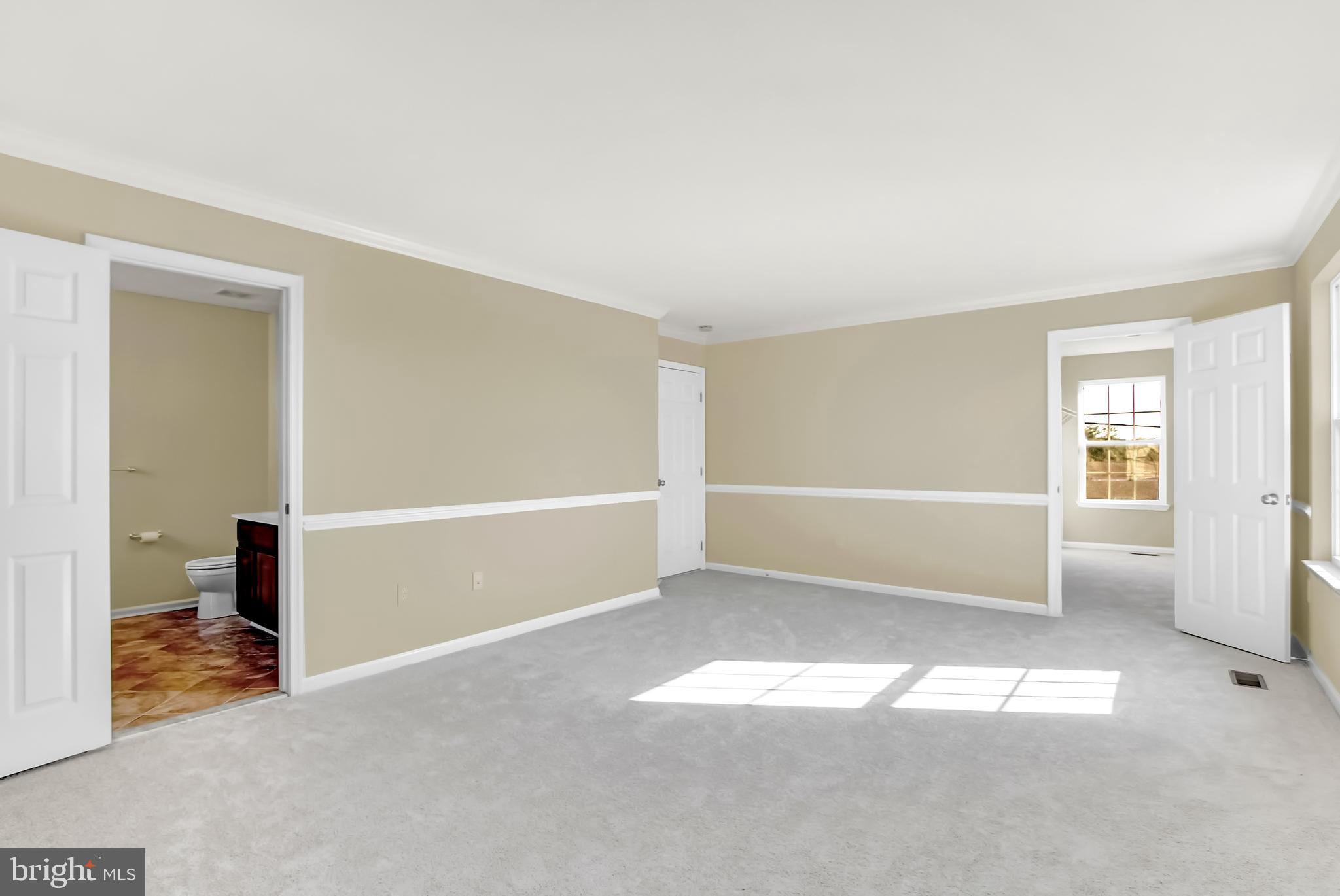 4721 Ridge Road Baltimore, MD 21236 - Photo 13 of 29 Master walk-in Closet (with window) - Master Bath