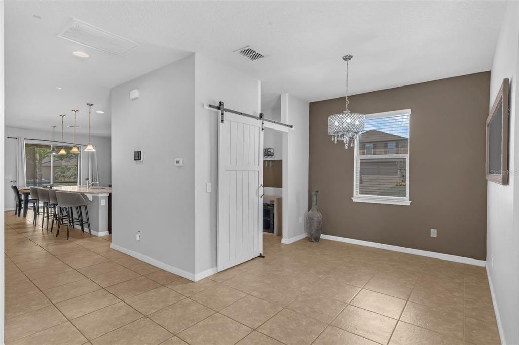 1641 Regal River Circle Ocoee, FL 34761 - Photo 11 of 42 a view of kitchen with furniture and window