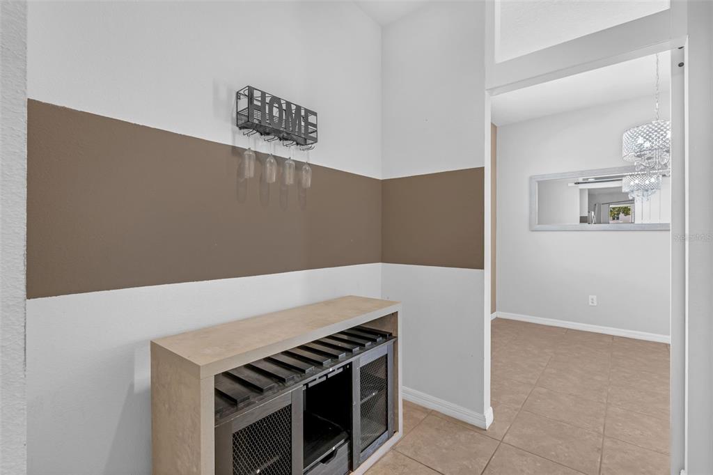 1641 Regal River Circle Ocoee, FL 34761 - Photo 12 of 42 a kitchen with a stove and a microwave