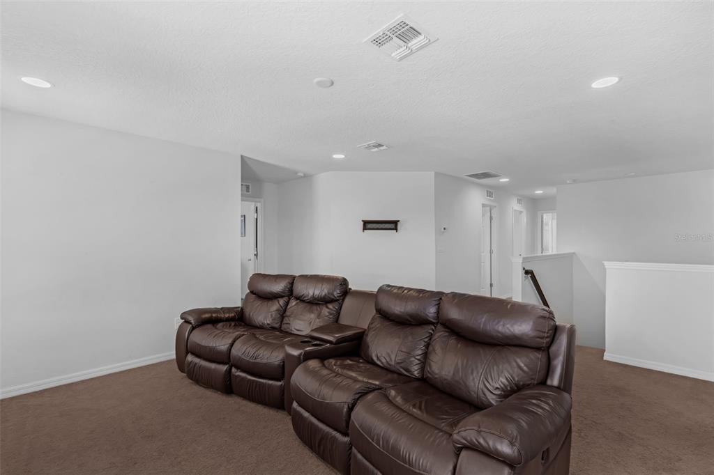 1641 Regal River Circle Ocoee, FL 34761 - Photo 20 of 42 a living room with furniture