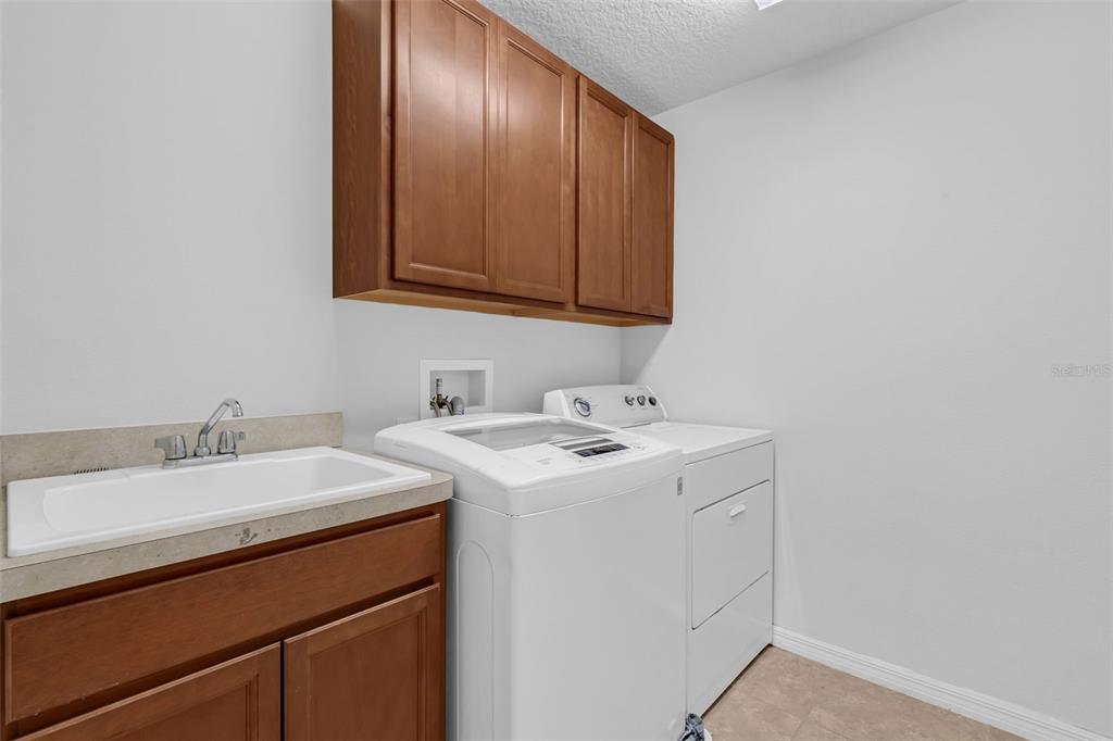 1641 Regal River Circle Ocoee, FL 34761 - Photo 31 of 42 a bathroom with a sink and a mirror