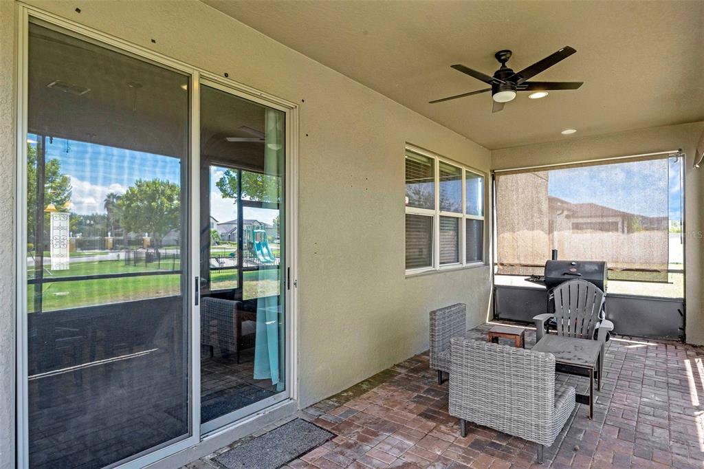 1641 Regal River Circle Ocoee, FL 34761 - Photo 41 of 42 a living room with furniture and a window