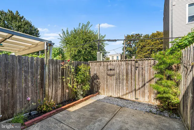 a view of a wooden fence