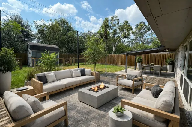a view of swimming pool with a patio