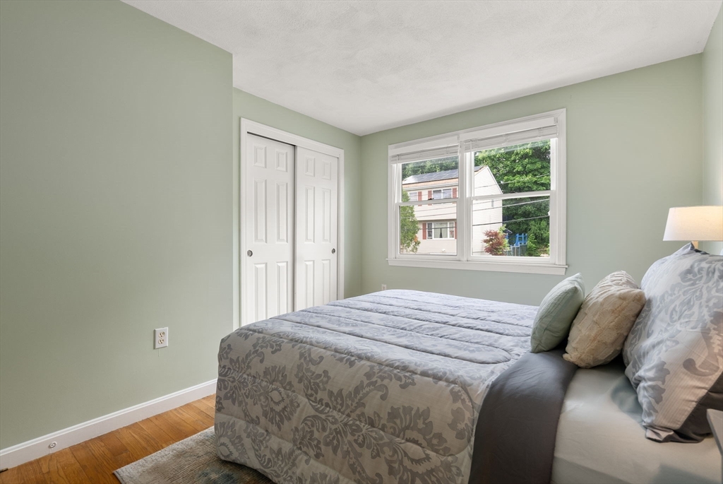 226 Pine Hill Circle Waltham, MA 02451 - Photo 19 of 28 a bedroom with a bed and a window