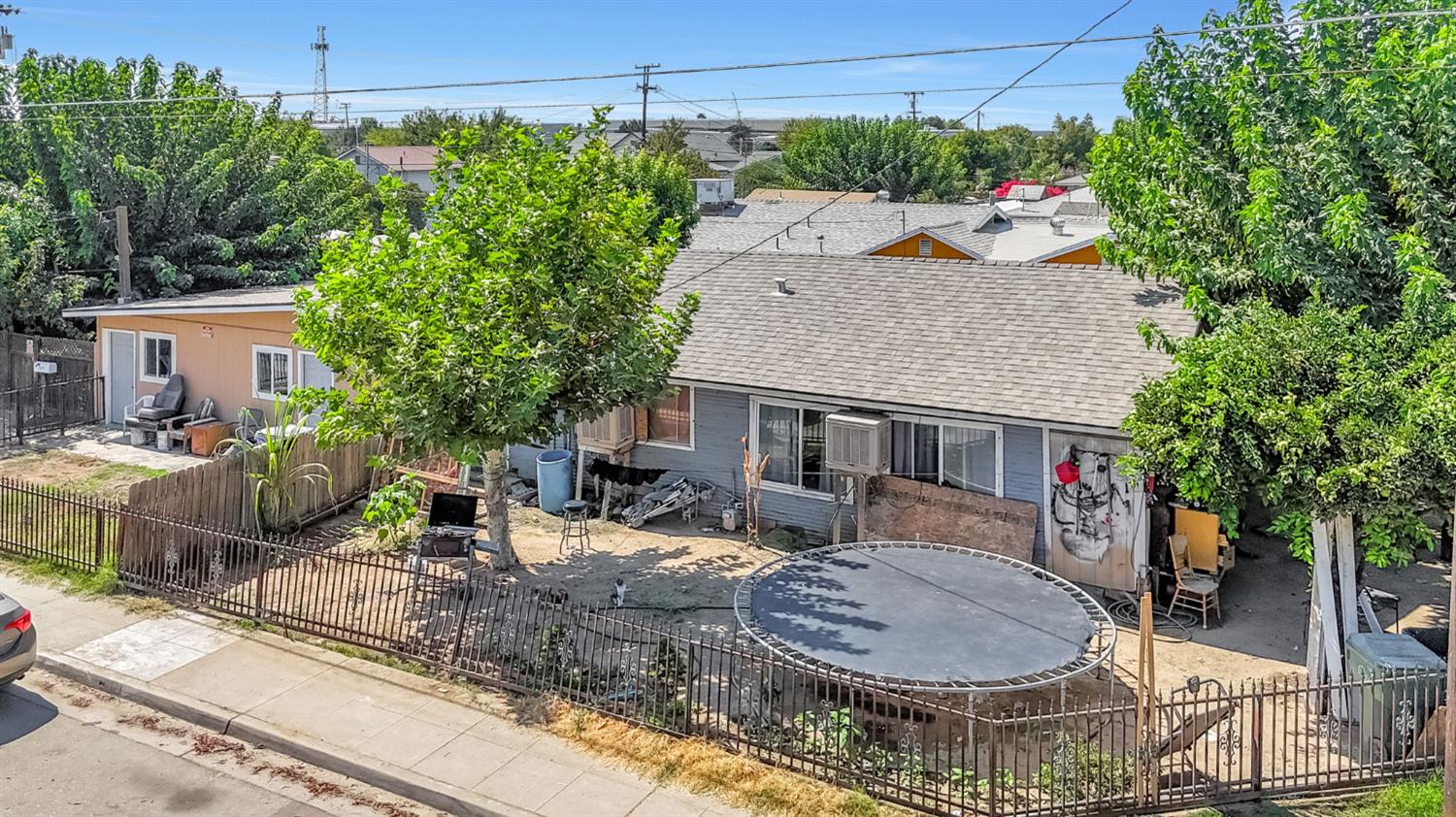 255 J Street Parlier, CA 93648 - Photo 16 of 19 a backyard of a house with seating space