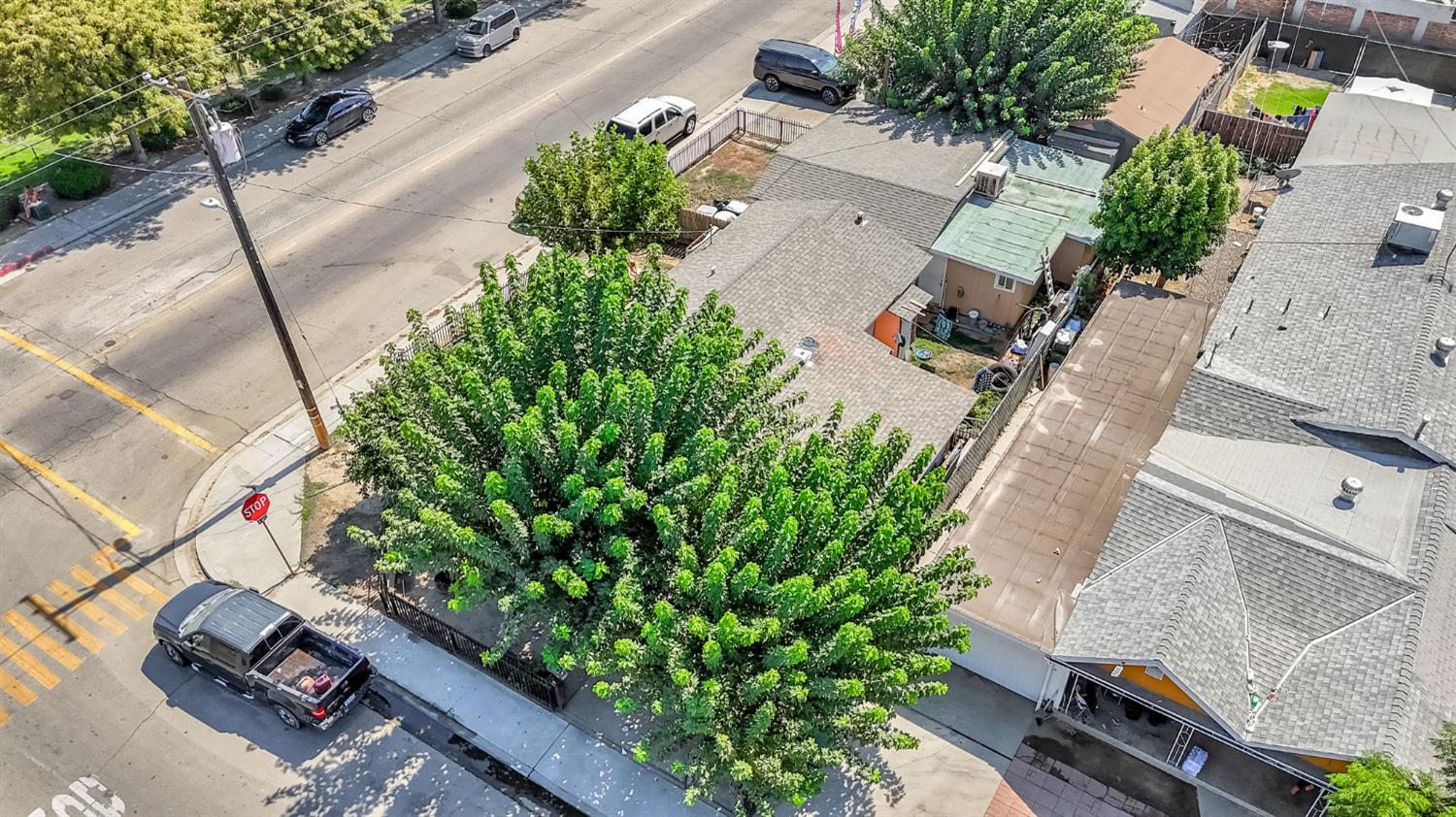 255 J Street Parlier, CA 93648 - Photo 3 of 19 an aerial view of a house with a yard