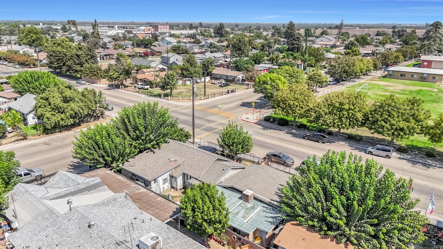 255 J Street Parlier, CA 93648 - Photo 5 of 19 an aerial view of residential houses with outdoor space