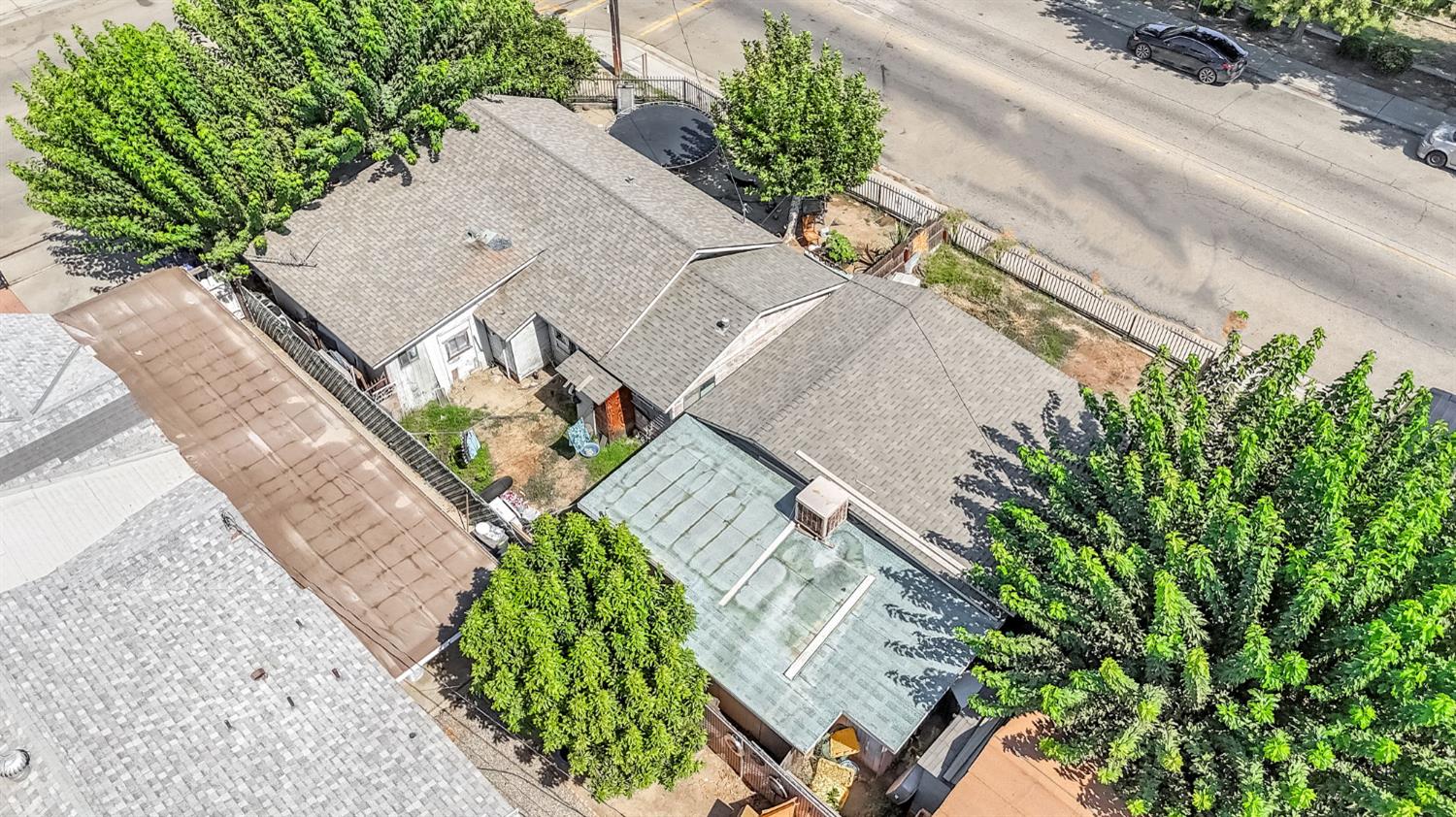 255 J Street Parlier, CA 93648 - Photo 6 of 19 a view of a yard with potted plants
