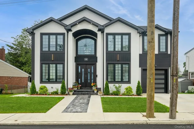 a view of outdoor space yard and front view of a house