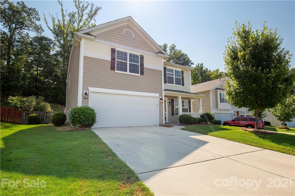 3002 Arthur Road Indian Land, SC 29707 - Photo 2 of 25 a front view of a house with a yard and garage