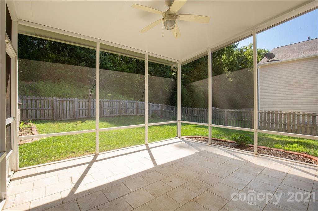 3002 Arthur Road Indian Land, SC 29707 - Photo 22 of 25 a view of an empty room with wooden floor and a window