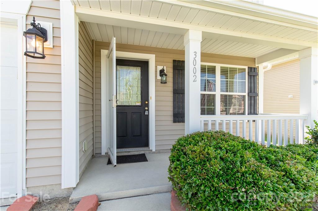 3002 Arthur Road Indian Land, SC 29707 - Photo 4 of 25 a view of a house with a door and wooden walls