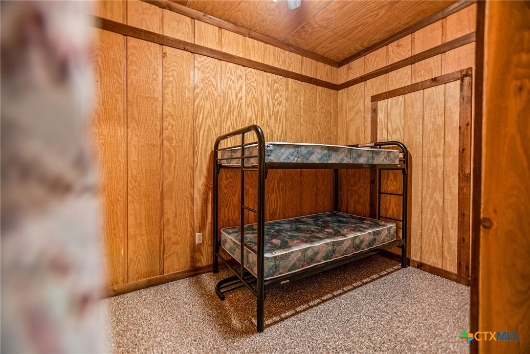 211 Taylor Avenue Port O'Connor, TX 77982 - Photo 17 of 43 a bedroom with bunk bed
