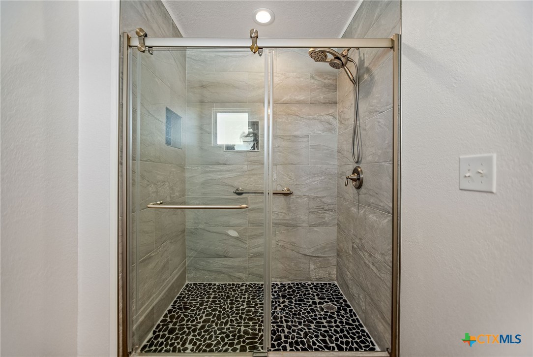 211 Taylor Avenue Port O'Connor, TX 77982 - Photo 36 of 43 a bathroom with a shower