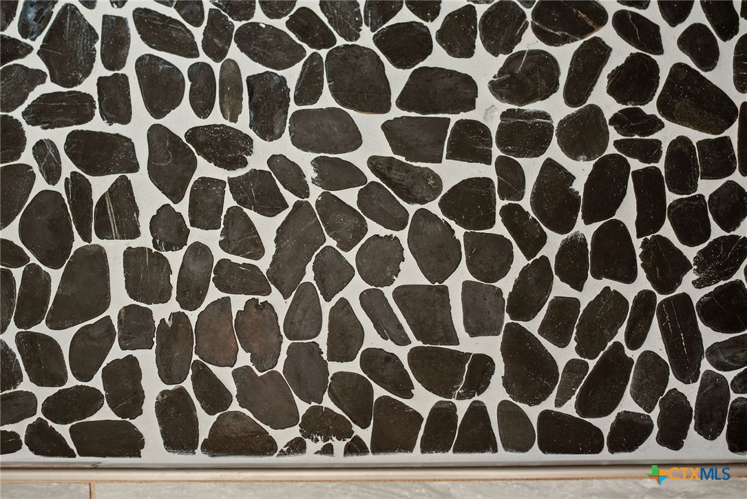 211 Taylor Avenue Port O'Connor, TX 77982 - Photo 43 of 43 a bathroom with a checkered floor