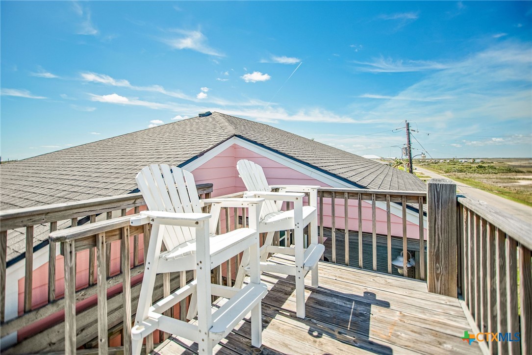 211 Taylor Avenue Port O'Connor, TX 77982 - Photo 5 of 43 a view of a building from a roof deck