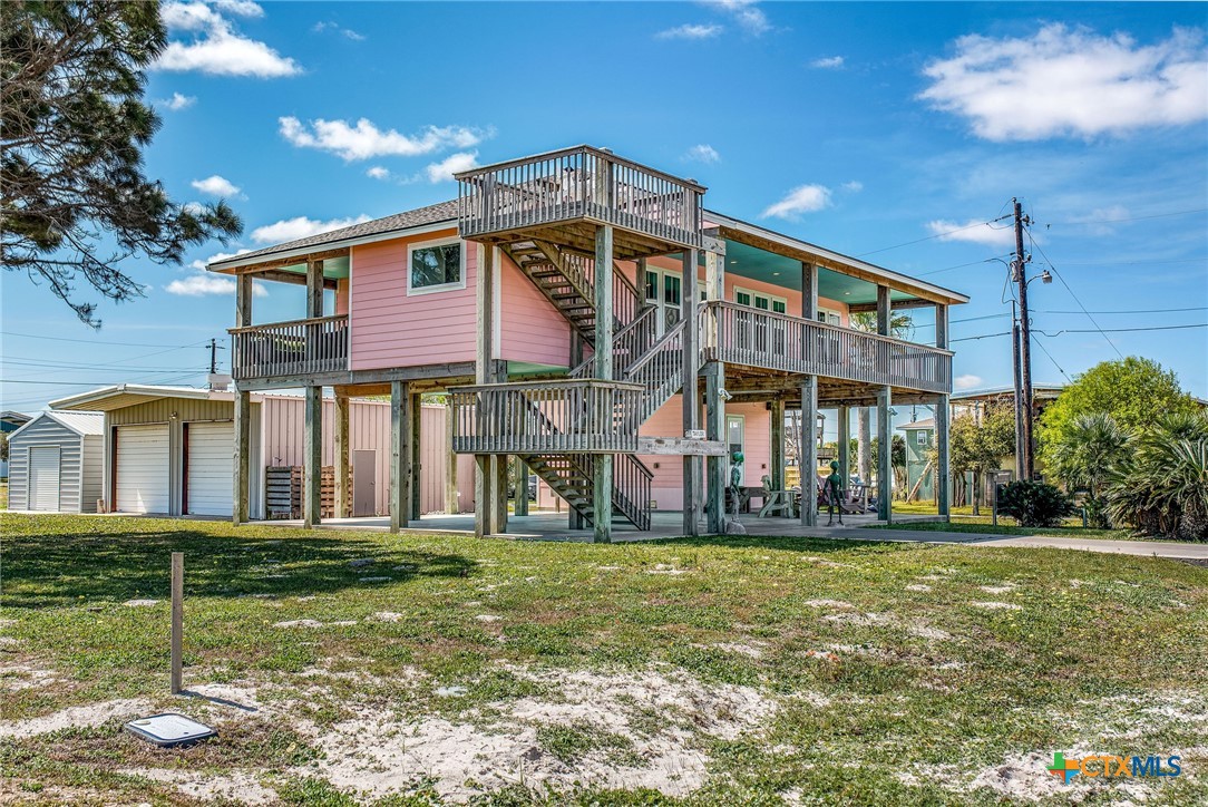 211 Taylor Avenue Port O'Connor, TX 77982 - Photo 6 of 43 a front view of building with yard