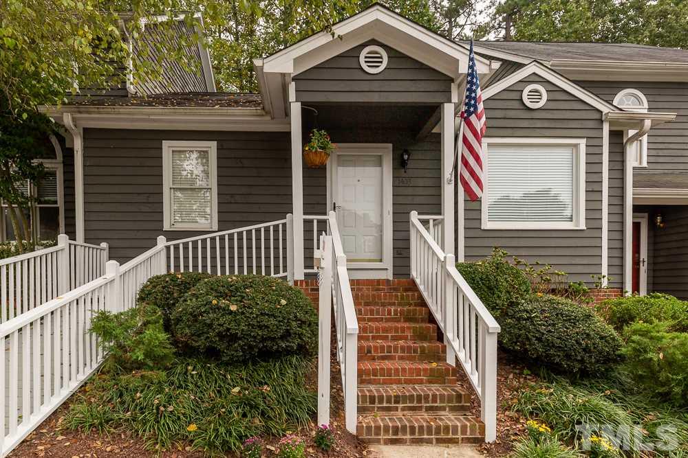 1403 Quarter Point Raleigh, NC 27615 - Photo 1 of 19 a view of a house with wooden fence
