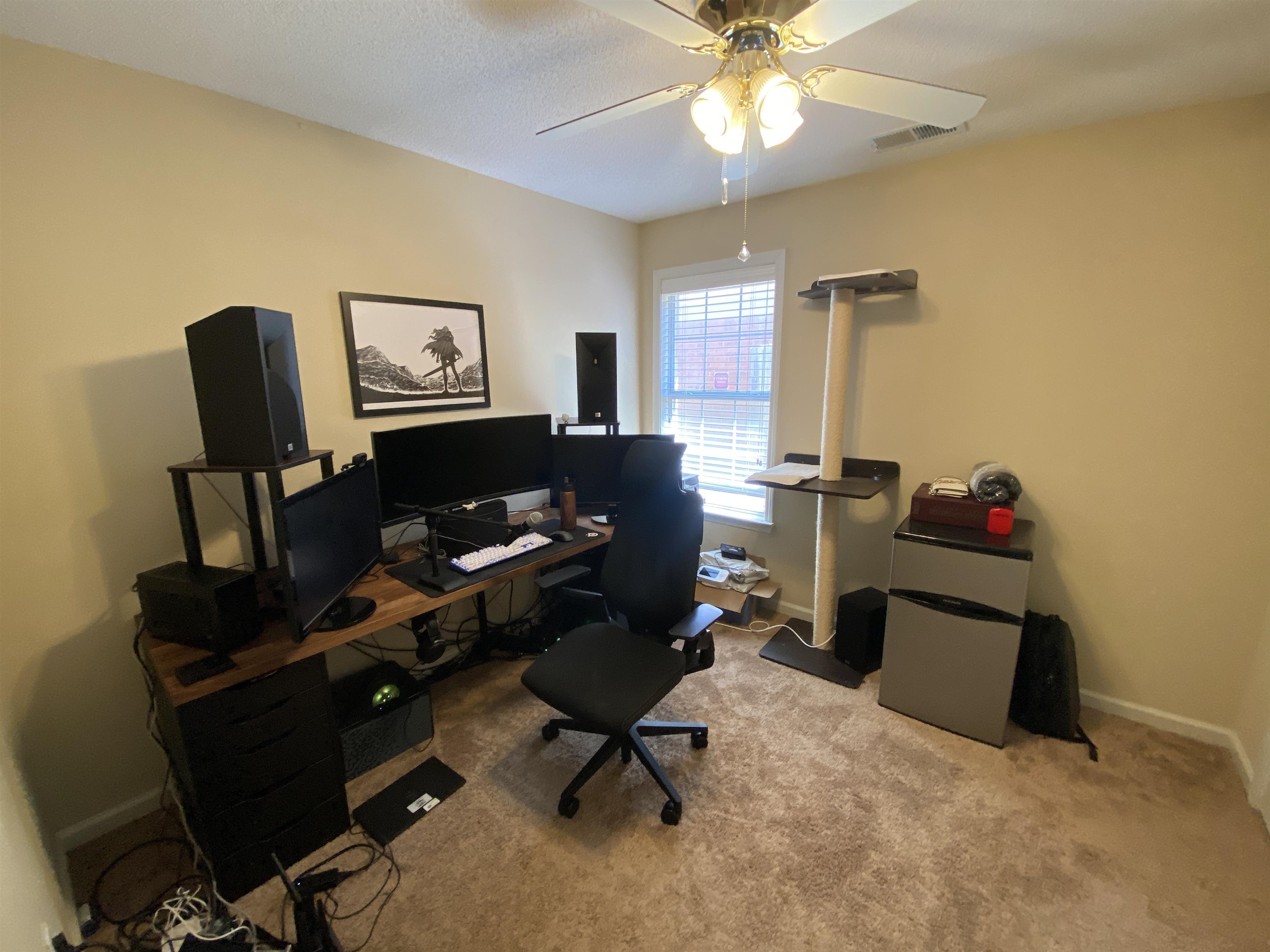 5632 Sycamore Ridge Road Memphis, TN 38134 - Photo 17 of 18 a view of a workspace with furniture and a window