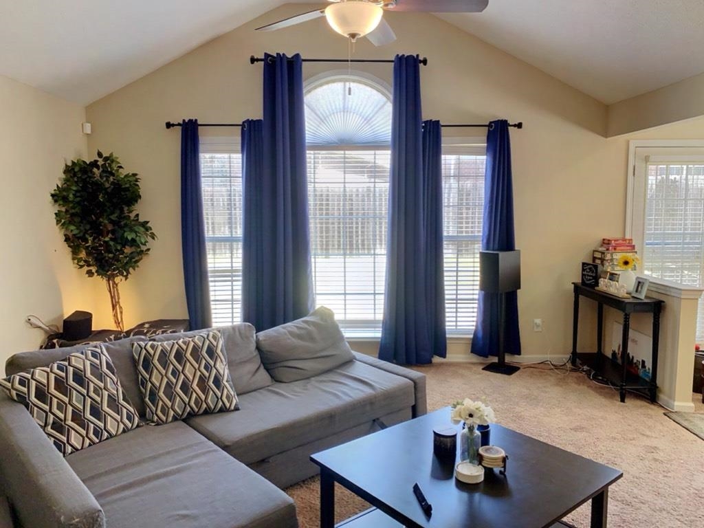 5632 Sycamore Ridge Road Memphis, TN 38134 - Photo 3 of 18 a living room with furniture and a potted plant