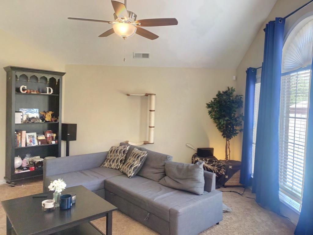 5632 Sycamore Ridge Road Memphis, TN 38134 - Photo 10 of 18 a living room with furniture and a large window