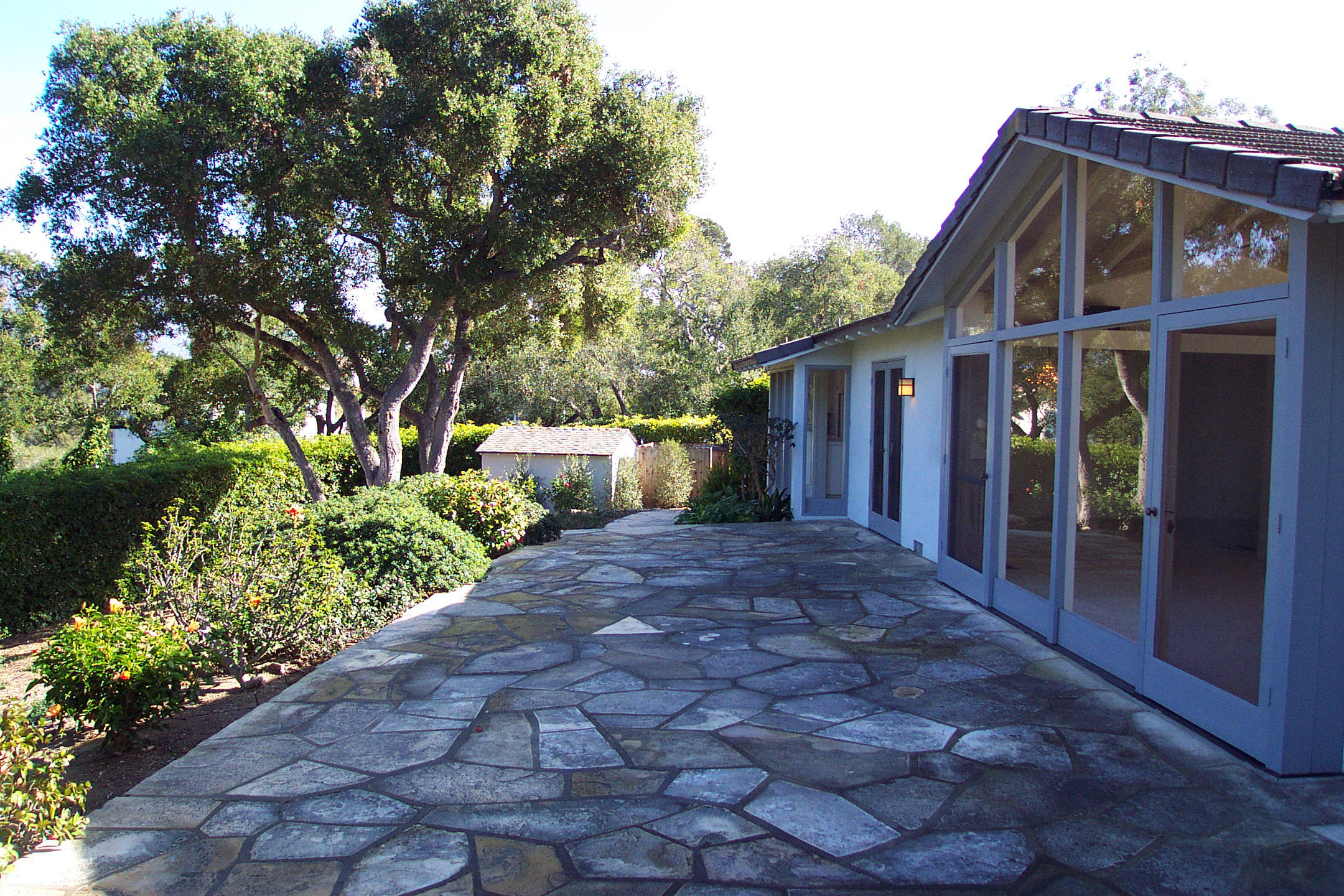 944 Arcady Road Montecito, CA 93108 - Photo 13 of 22 a front view of a house with a yard and a garage