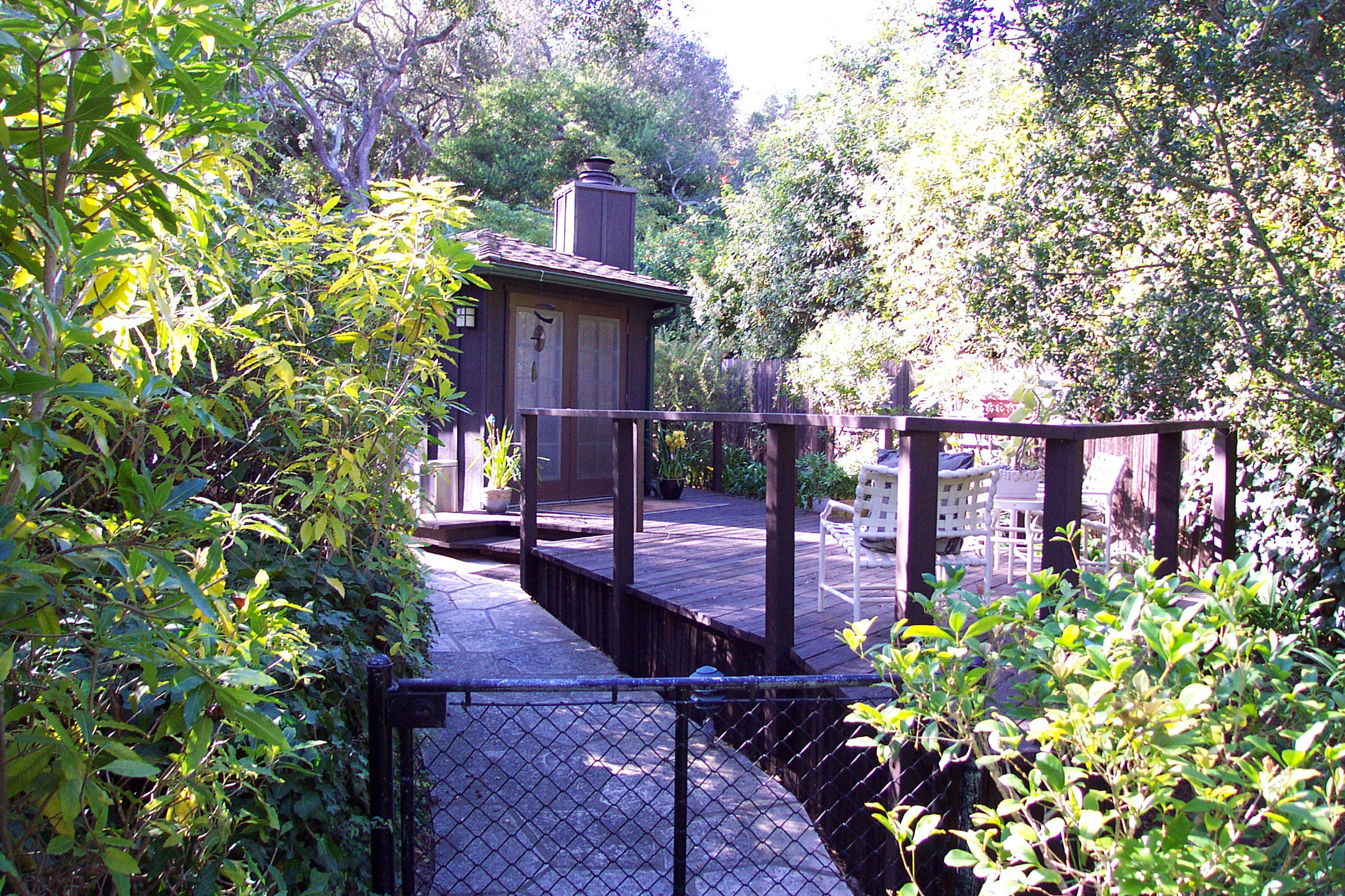 944 Arcady Road Montecito, CA 93108 - Photo 17 of 22 a pathway of a house with potted plants
