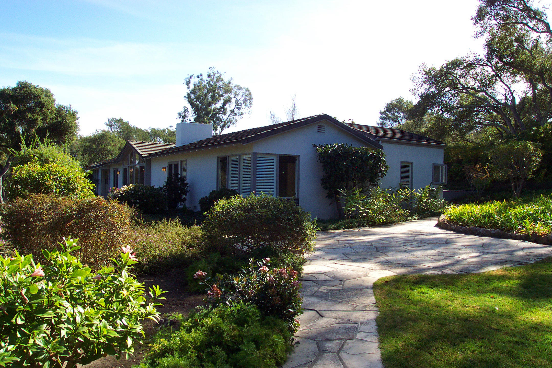 944 Arcady Road Montecito, CA 93108 - Photo 20 of 22 a view of a house with a yard and potted plants