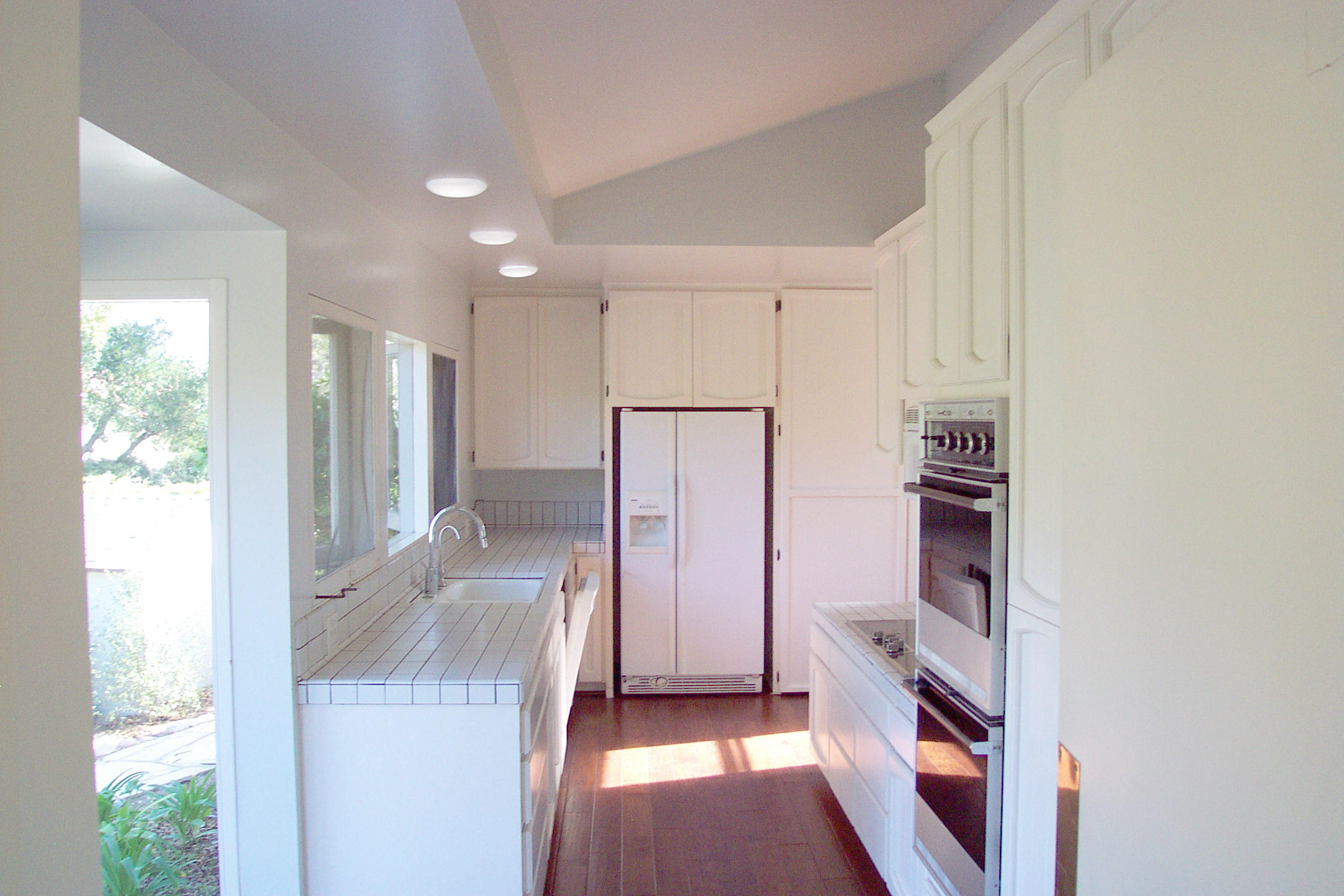 944 Arcady Road Montecito, CA 93108 - Photo 3 of 22 a view of a kitchen with refrigerator and wooden floor