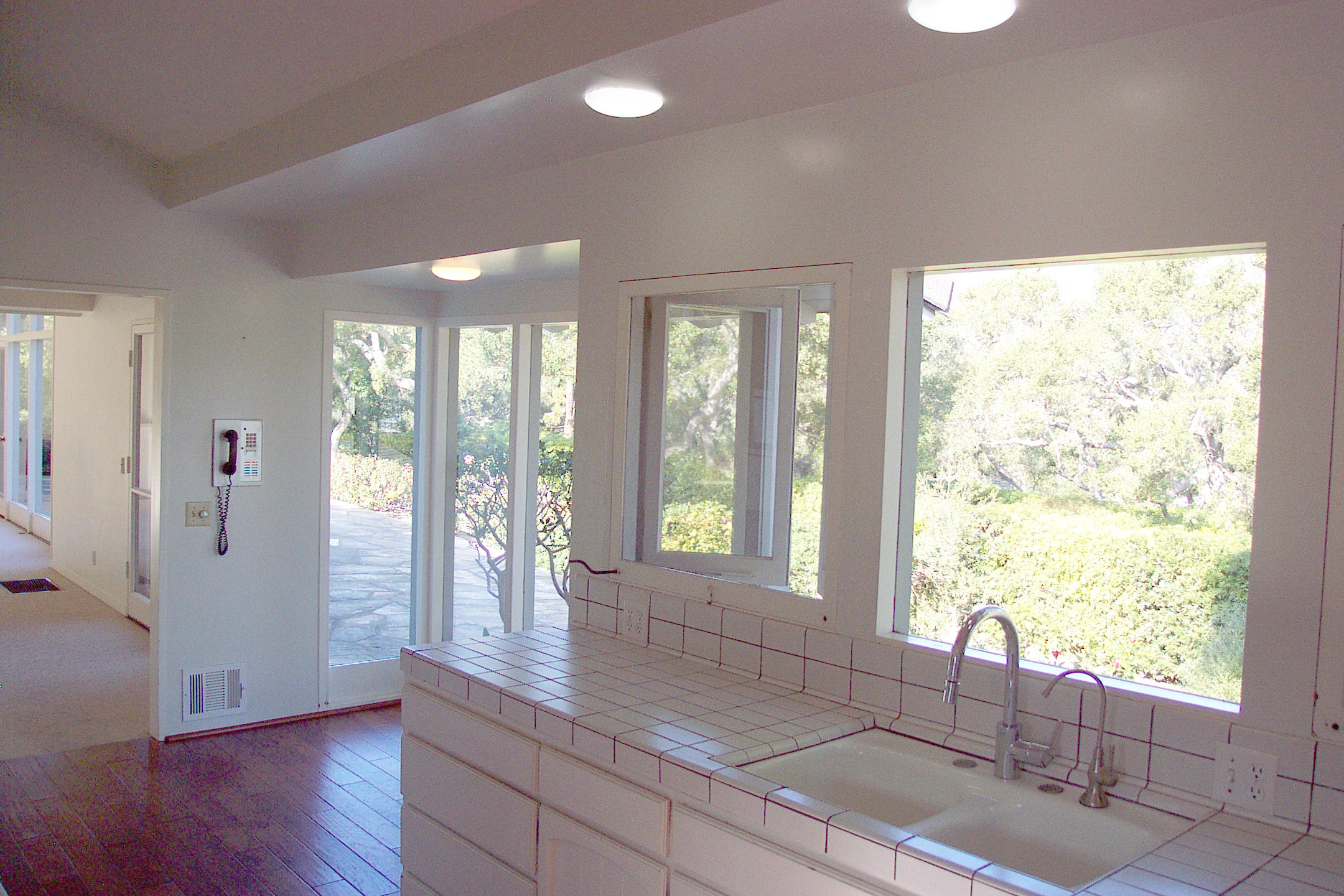944 Arcady Road Montecito, CA 93108 - Photo 4 of 22 a view of an entryway with wooden floor and windows