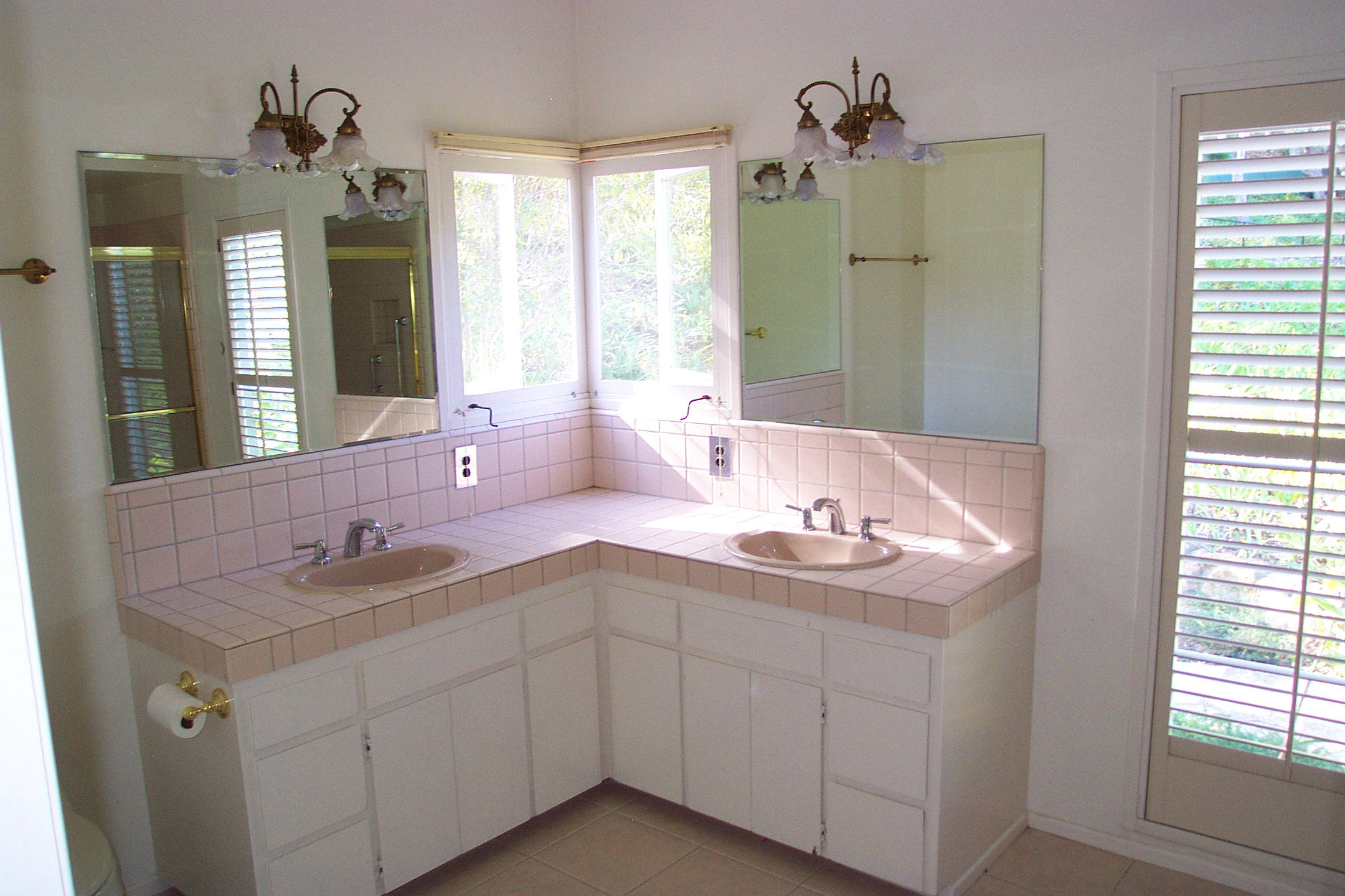 944 Arcady Road Montecito, CA 93108 - Photo 9 of 22 a bathroom with a sink and a mirror
